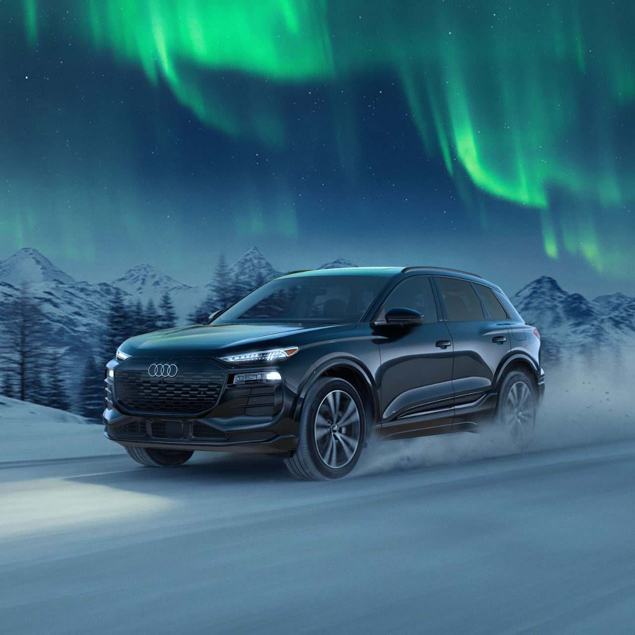 Right profile view of an Audi Q8 e-tron parked.